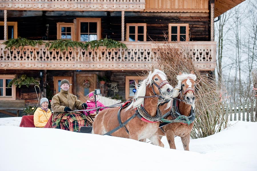 altenmarkt-zauchensee-tourismus winter sport bewegung familie pferdeschlitten